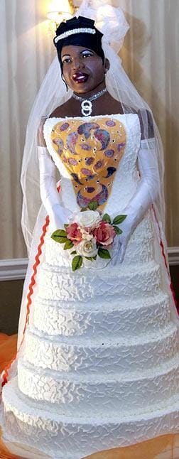 Lady makes herself a life sized cake for her wedding